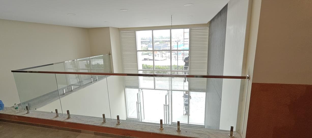 Glass railing interior stairwell